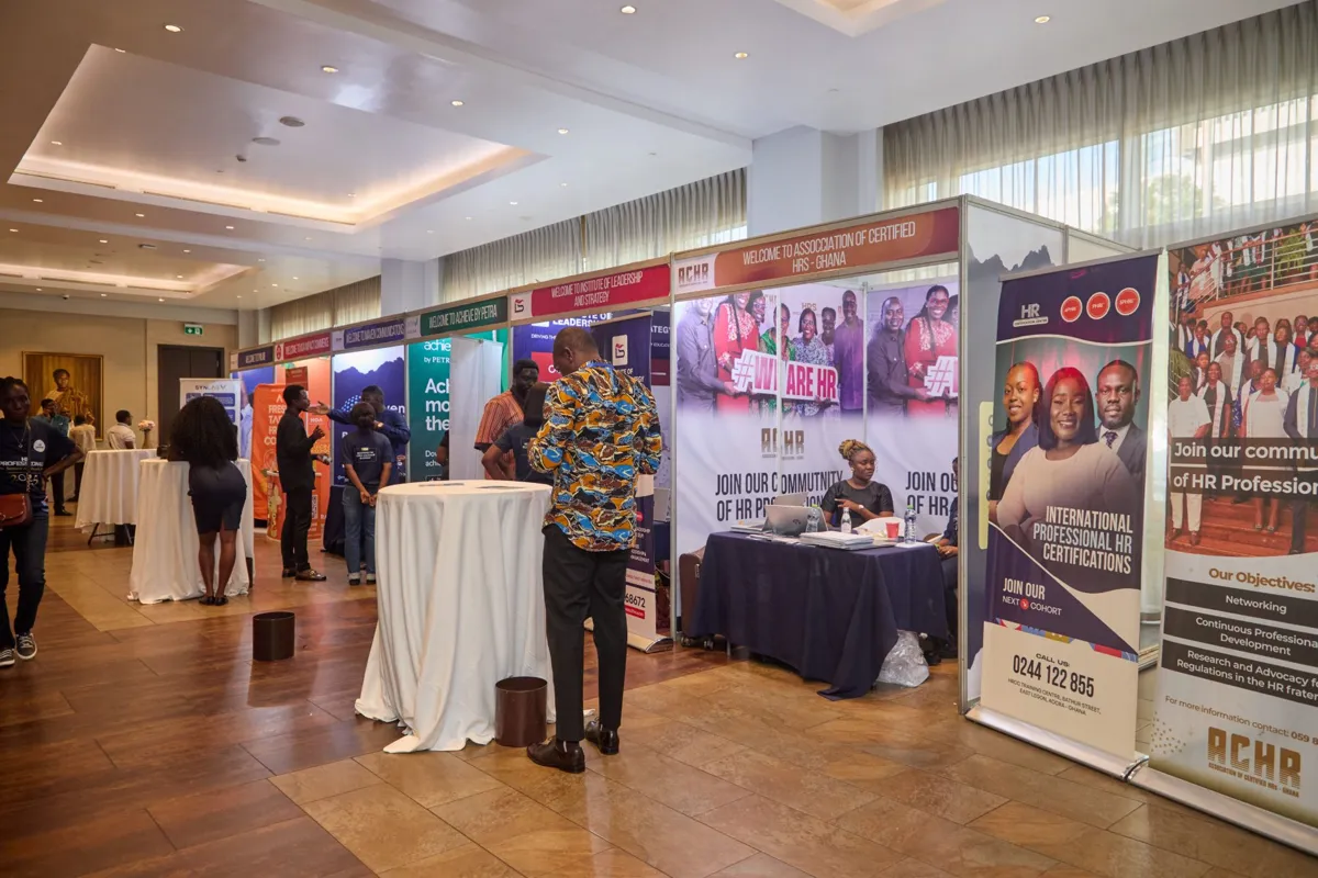 Exhibitors and guests at the summit exhibition booths